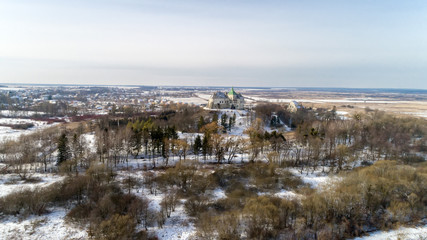 Fototapeta na wymiar Aerial view of the Olesky Castle and residential neighborhoods near it