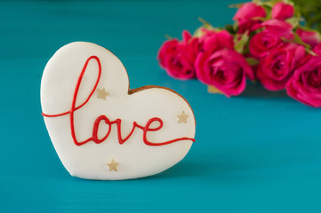 Concept love. Gingerbread in the shape of heart with the inscription love. gift in the box. make a proposal to marry