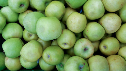 Green apples on the market