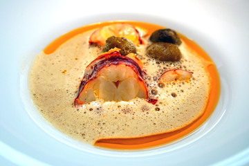 Gourmet seafood bisque soup with lobster in a French restaurant