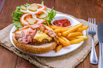 bacon cheeseburger and fries