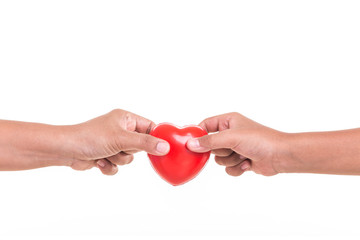 Love Mom Concept : Daughter holding and giving red heart to her mother hand isolated on white
