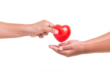 Love Mom Concept : Mother holding and giving red heart to her daughter hand isolated on white