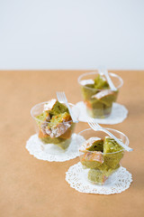 Matcha cakes bits served in individual cups. 