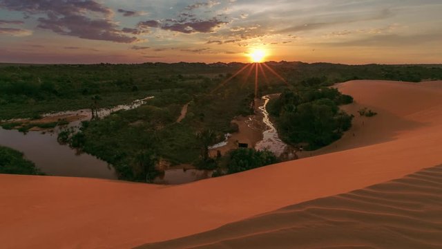 Beautiful orange sunset from top of sand dune at Brazilian Jalap&atilde;o State Park