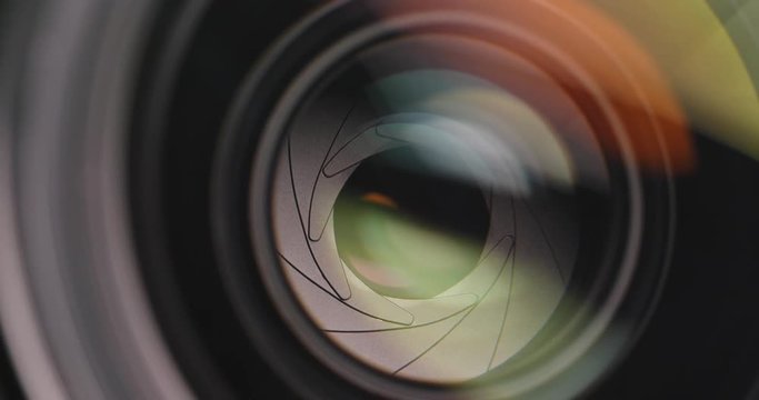 Professional camera lens zooming in and out