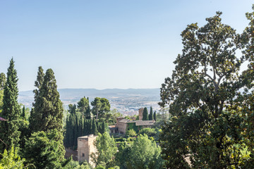Fototapeta na wymiar View of the bell tower of the Alhambra from the Generalife gardens in Granada, Spain, Europe