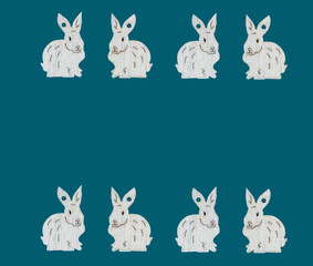 White easter bunnies on blue