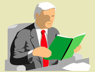 Businessman sitting at a desk, reading reports.