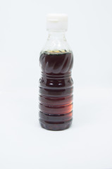 fish sauce in plastic bottle on white background