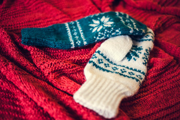Two knitted mittens.