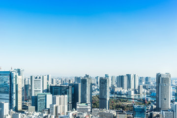 Fototapeta na wymiar Asia Business concept for real estate and corporate construction - panoramic modern city skyline bird eye aerial view near tokyo tower under bright sun and vivid blue sky in Tokyo, Japan