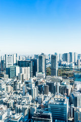 Fototapeta premium Asia Business concept for real estate and corporate construction - panoramic modern city skyline bird eye aerial view near tokyo tower under bright sun and vivid blue sky in Tokyo, Japan