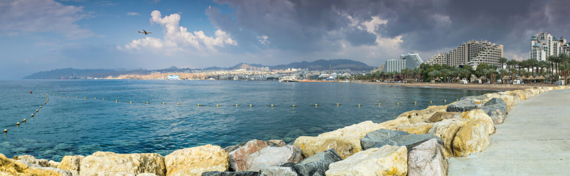 Panoramic view on central public beach of Eilat - the southernmost port and famous resort and recreational city in Israel
