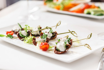 tasty canape with dried tomatoes
