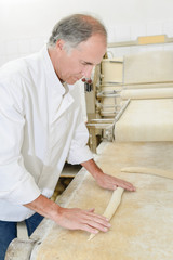 Baker making bread