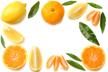 mandarin with slices, lemon and green leaf isolated on white background top view