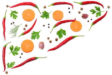 mix red hot chili peppers with parsley and sliced carrot and garlic isolated on white background top view