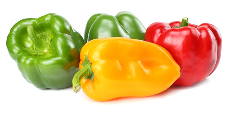 green, red, yellow sweet bell peppers isolated on white background