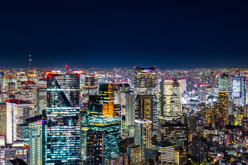 Asia Business concept for real estate & corporate construction - panoramic modern city skyline view with neon night in Roppongi Hill, Tokyo, Japan