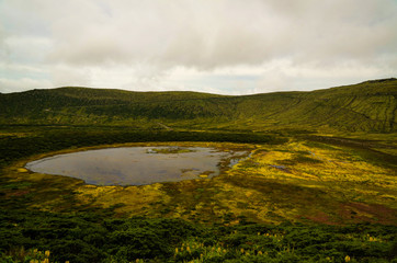 Panoramic view to Caldeira Branca lake at Flores island, Azores. Portugal