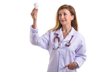 Beautiful caucasian doctor wear white suit and holding white light bulb with red stethoscope isolated on white