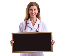 Beautiful caucasian doctor wear white suit and holding blank black board for text with red stethoscope isolated on white