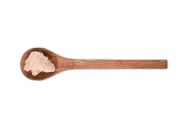 fresh ginger  root on wooden spoon isolated on white background