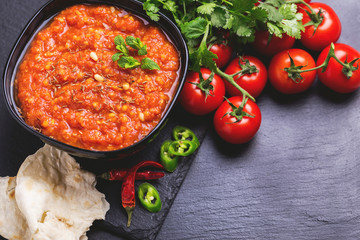 Indian Tomato Rasam with lentil, mint, cilantro and cashew