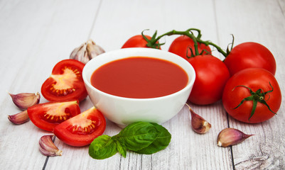 Bowl with tomato sauce