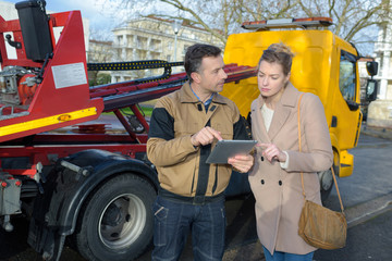 female with tow car assistant