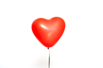 red heart balloons on a white
