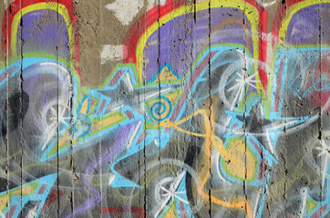 Close-up fragment of a graffiti drawing applied to the wall by aerosol paint. Background image of a...