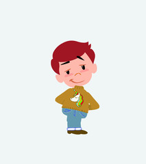 White boy with a unicorn pullover smiling peacefully.