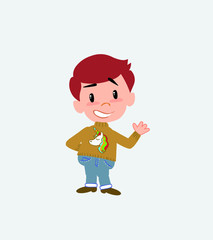 White boy with a unicorn pullover showing something in positive attitude.