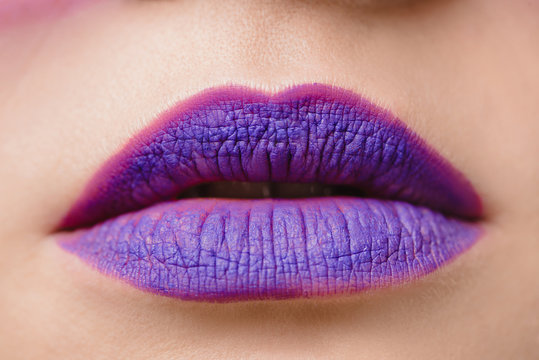 cropped image of female purple lips