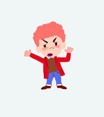 White boy in jeans argues something with a gesture of discontent.