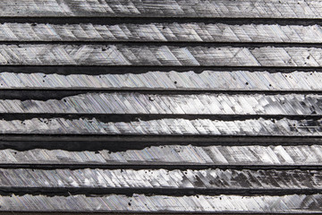 metal seen sideways, cleavage after sawing, background