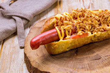 American hot dog with fried onions