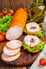 Sausage cut on a wooden board