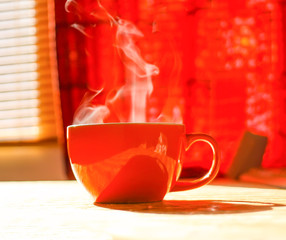 Ceramics cup of hot organic herbal tea.