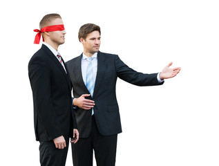 Young Businessman Assisting Blindfolded Partner