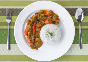 Pork ribs stir with thai red curry served with rice