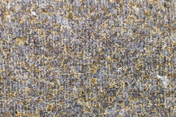 Stone background with vertical grinding lines