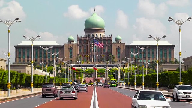 Beautiful exterior wide shot putrajaya mosque at Putra Jaya city, Kuala Lumpur busy road.