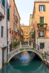 Fototapeta na wymiar bridge over Venetian Canal, Venice Italy