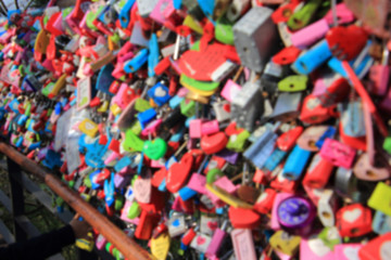 Fototapeta na wymiar Abstract blurred colorful love padlock at Seoul tower