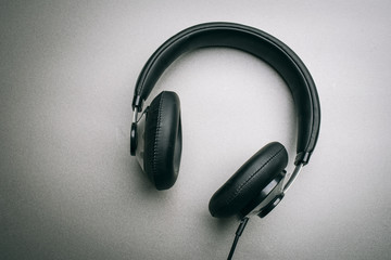 Fototapeta na wymiar Headphones on a gray background