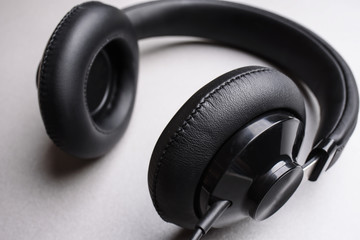 Obraz na płótnie Canvas Headphones close-up on a gray background