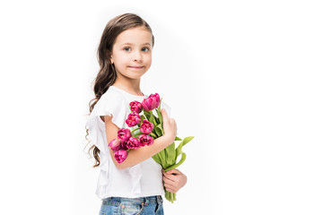 portrait of cute child with bouquet of flowers in hands isolated on white, mothers day concept